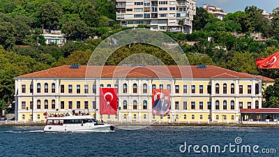 Kabatas Erkek Lisesi building, or Kabatas High School, suited by Bosphorus Strait in Ortakoy, Besiktas, Istanbul, Turkey Editorial Stock Photo