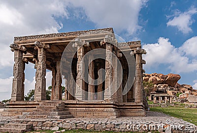 Kadelekalu Ganesha temple in front of boulders, Hampi, Karnataka, India Stock Photo