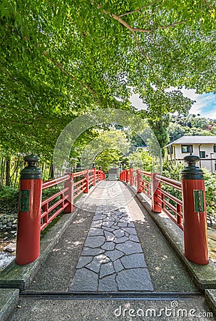 Kaedebashi Bridge over the Kitamata river in the Shuzenji hot spring area of Izu City. Narrrow path bamboo grove in the back Editorial Stock Photo