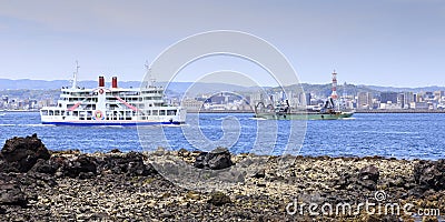 Kagoshima and boat view from Sakurjima Japan. Editorial Stock Photo