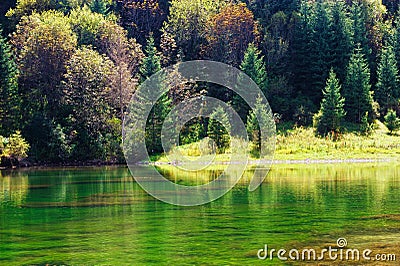 Kaindy green Lake in Tien Shan mountain, Kazakhstan. Autumn Stock Photo