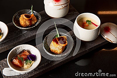 Kaiseki sushi platter combo set on the serving board in the fine dining Japanese restaurant Stock Photo