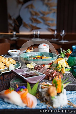 Kaiseki sushi platter combo set on the serving board in the fine dining Japanese restaurant Stock Photo