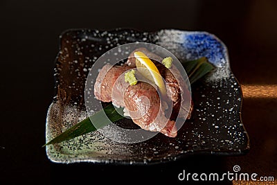 Kaiseki sushi platter combo set on the serving board in the fine dining Japanese restaurant Stock Photo