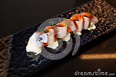 Kaiseki sushi platter combo set on the serving board in the fine dining Japanese restaurant Stock Photo