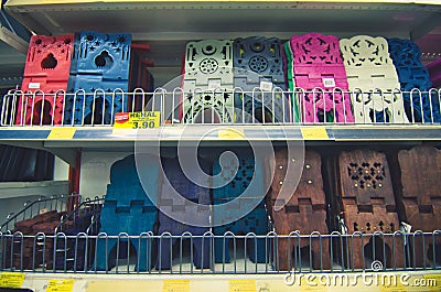 KAJANG, MALAYSIA-28 MAY 2019: Variety of rehal for holding holy koran display on shelf for sale in the supermarket Editorial Stock Photo