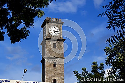 Close shot of Library clock tower building isolated in Gulbarga University campus Kalaburagi Editorial Stock Photo