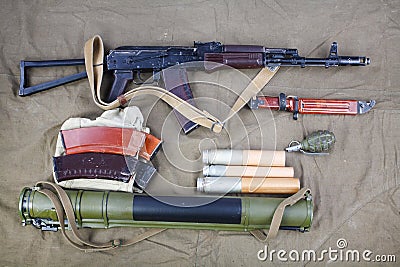 Kalashnikov AK 74 with ammunitions on canvas Stock Photo