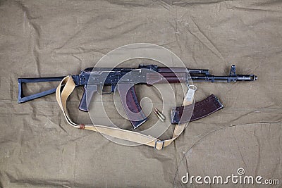 Kalashnikov AK 74 with ammunitions on canvas Stock Photo