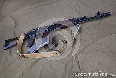 Kalashnikov AK 74 with ammunitions on canvas Stock Photo