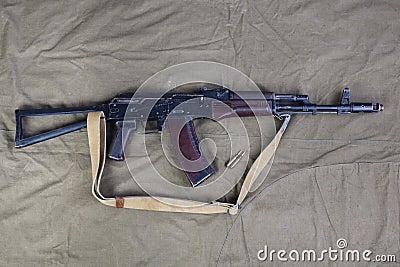 Kalashnikov AK 74 with ammunitions on canvas Stock Photo