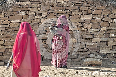 Kalbelia gypsy family living on the edge of poverty in the Thar desert at the confluence of tourist roads passing through the dese Editorial Stock Photo