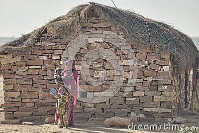 Kalbelia gypsy family living on the edge of poverty in the Thar desert at the confluence of tourist roads passing through the dese Editorial Stock Photo