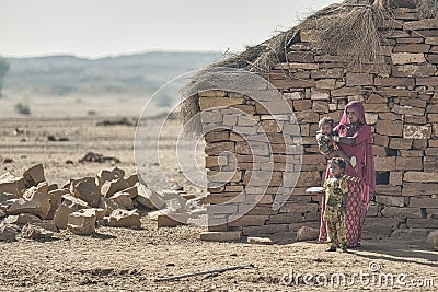Kalbelia gypsy family living on the edge of poverty in the Thar desert at the confluence of tourist roads passing through the dese Editorial Stock Photo