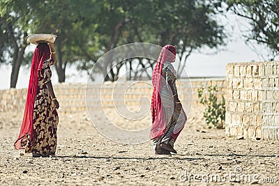 Kalbelia gypsy family living on the edge of poverty in the Thar desert at the confluence of tourist roads passing through the dese Editorial Stock Photo