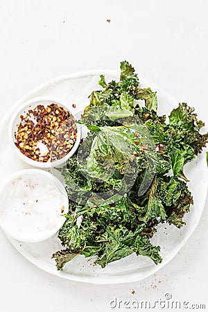 Kale chips with chilli flakes Stock Photo