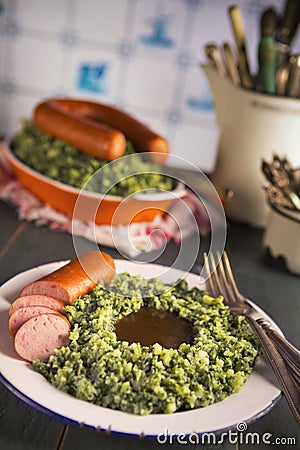 Kale with smoked sausage or 'Boerenkool met worst' Stock Photo