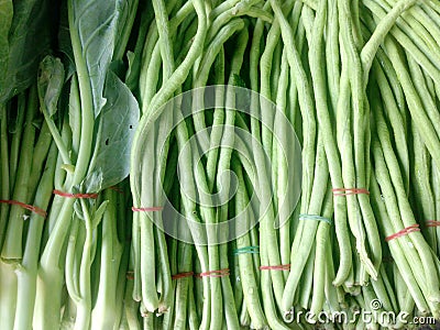 Kale and Yardlong beans in market. Stock Photo