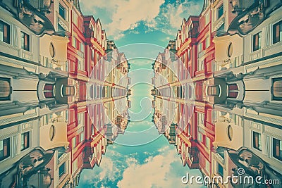 Kaleidoscopic symmetry with mirrored, colorful geometric patterns creating a psychedelic effect. Stock Photo