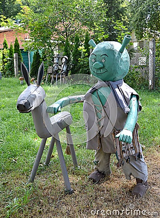 KALININGRAD REGION, RUSSIA. Wooden sculptures Shrek and donkey Editorial Stock Photo