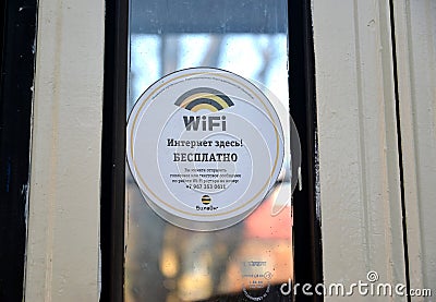 KALININGRAD, RUSSIA. The sign Wi-fi on a tram door. The Russian text - the free Internet Editorial Stock Photo