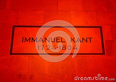 KALININGRAD, RUSSIA. Inscription `Immanuel Kant 1724-1804` on the wall of the burial in red decorative lighting Editorial Stock Photo
