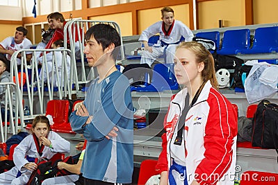 KALININGRAD, RUSSIA - MARCH 13, 2016: Viewers and participants of the Tournament of Taekwondo Koenig Open among teenage in Editorial Stock Photo