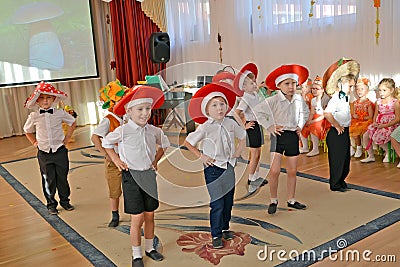 KALININGRAD, RUSSIA. Boys execute dance of mushrooms. A morning performance in kindergarten Editorial Stock Photo