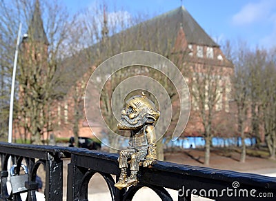KALININGRAD, RUSSIA. A sculpture of grandfather-Homlin against the background of the Cathedral Editorial Stock Photo