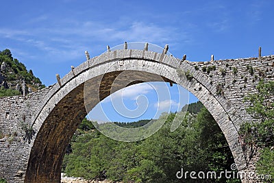Kalogeriko arched stone bridge Zagoria Stock Photo