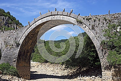 Kalogeriko arched stone bridge Zagoria Stock Photo