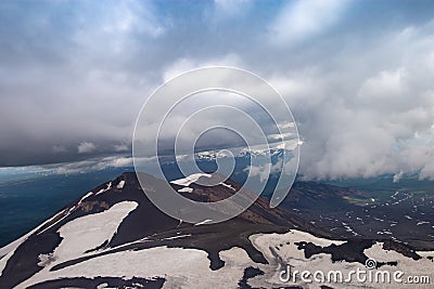Melting snow in June on the Kamchatka Peninsula. Russia Stock Photo