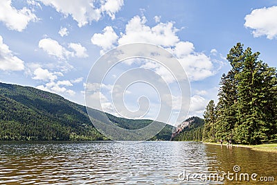 KAMLOOPS, CANADA - JULY 08, 2020: Paul Lake Summer time with green mountains and white clouds british columbia canada Stock Photo