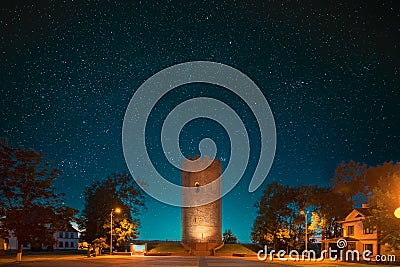 Kamyenyets, Brest Region, Belarus. Amazing Bright Starry Sky Above Tower Of Kamyenyets In Evening Time. Night Dramatic Stock Photo