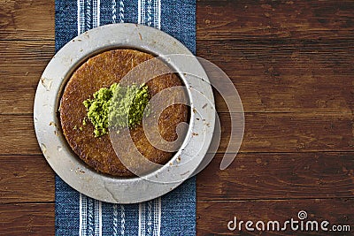 Kanafeh cheese pastry plate on table Stock Photo