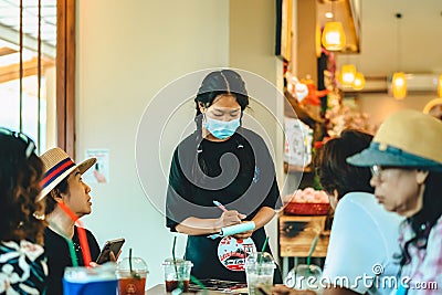 KANCHANABURI -THAILAND, APRIL 1, 2023 : Unidentified Tourists come to visit and have lunch or coffee with Japanese and Thai food Editorial Stock Photo