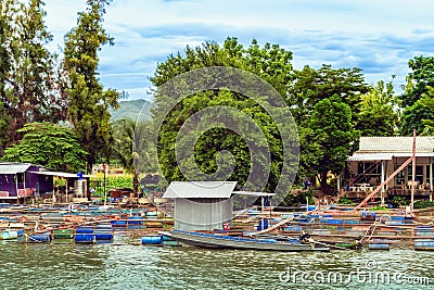 KANCHANABURI-THAILAND,AUGUST 30,2019 : Beautiful scenery view of Nile Red Tilapia fish cages aquaculture floating with floats from Editorial Stock Photo