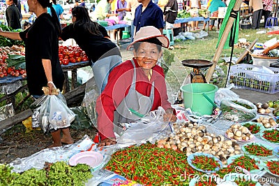 Kanchanaburi, Thailand: Woman Vendor at Market Editorial Stock Photo