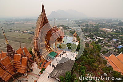 The Golden Buddha statue. Wat Tham Suea. Tha Muang district. Kanchanaburi. Thailand Editorial Stock Photo