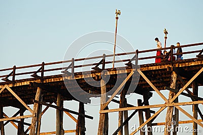 Sangklaburi or Myanmar tall wooden bridge on Songaria River Editorial Stock Photo