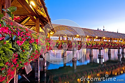 Kapellbrucke historic wooden bridge in Luzern sunset view Stock Photo