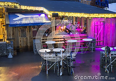 KAPRUN, AUSTRIA, March 13, 2019: Nigt outdoor view on illuminated Apres ski restaurant next to Kaprun cable station Editorial Stock Photo