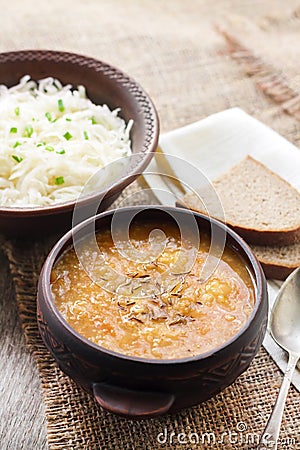 Kapustnyak - traditional Ukrainian winter soup with sauerkraut and millet Stock Photo