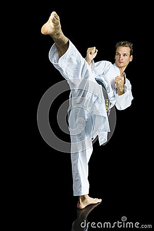 Karate kick Stock Photo