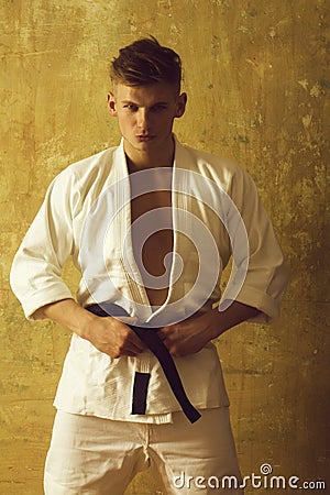 Karate man in white kimono Stock Photo