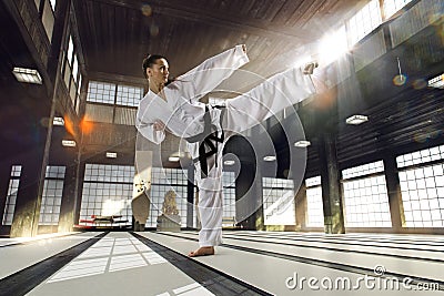 Karate woman in action Stock Photo