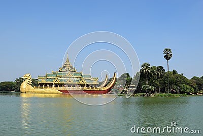 Karaweik temple in Kandawgyi lake, RangÃºn, Myanmar Stock Photo
