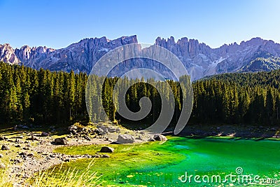 Karersee - Lago di Carezza A lake in the Dolomites in South Tyrol, Italy. Stock Photo