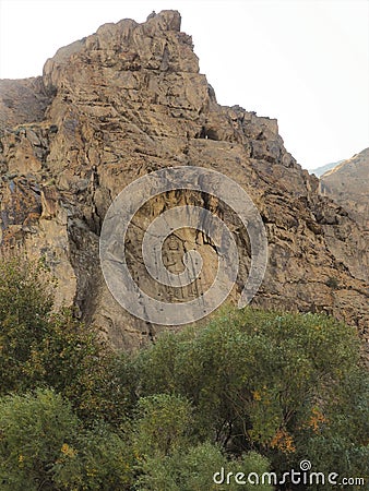 Kargah Buddha Mountain Rock Carving In Gilgit, Gilgit-Baltistan, Northern Pakistan Stock Photo