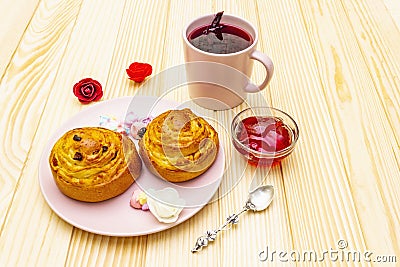 Karkade tea from hibiscus petals Sudanese rose. Gentle romantic breakfast concept. Buns, meringues, strawberry jelly. On a Stock Photo